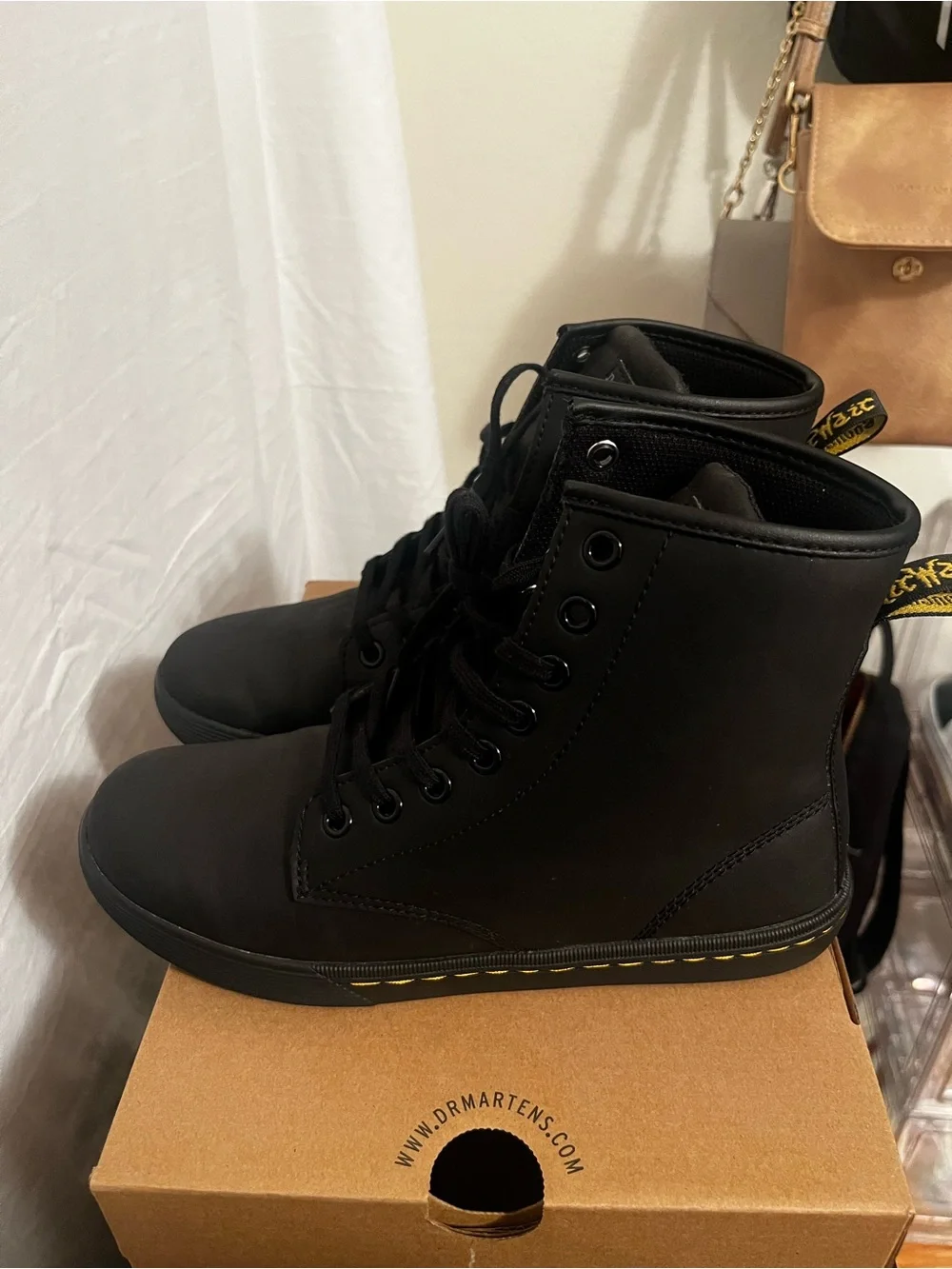 Dr. Martens Black High-Top Lace-Up Boots with Yellow Stitching